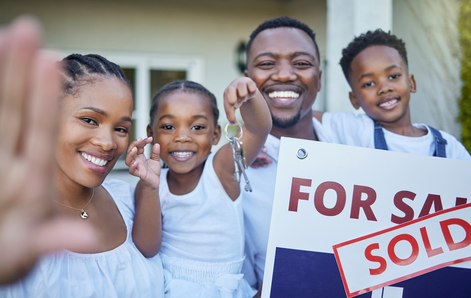 we-bought-the-house-shot-of-a-young-family-posing-2025-04-05-15-49-09-utc West Palm Beach Real Estate Agent